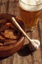 Beer in a glass and grain crouton. Beer and snack to beer.