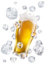 Beer glass surrounded with flying ice cubes. Conceptual picture of beer glass chilling