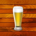 Beer glass on wood background Royalty Free Stock Photo