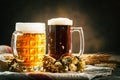 Beer in glasses on a dark background. Oktoberfest. Beer festival. Selective focus. Background with copy space. Royalty Free Stock Photo