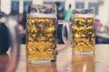 Beer glasses in german beer garden background Royalty Free Stock Photo