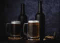 Beer glasses with lager, dark lager, brown ale, malt and stout beer on table, dark wooden background Royalty Free Stock Photo