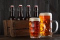 Beer glasses on table with crate Royalty Free Stock Photo