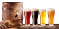 Beer glasses with a wooden barrel.