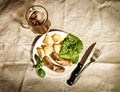 Beer with grilled sausages and roasted potato. Vintage style Royalty Free Stock Photo