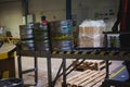 Beer kegs. many metal beer keg stand in rows in a warehouse Royalty Free Stock Photo