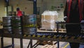Beer kegs. many metal beer keg stand in rows in a warehouse Royalty Free Stock Photo