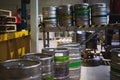 Beer kegs. many metal beer keg stand in rows in a warehouse Royalty Free Stock Photo