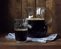 Beer or kvass. A pitcher with a dark drink. Royalty Free Stock Photo