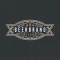 Beer label logotype concept in vintage style on dark background Royalty Free Stock Photo