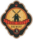 Beer label with windmill, laurel wreath and ribbon