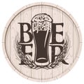 Beer label on wooden cask with full glass of beer