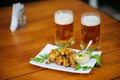 beer with meal on the table