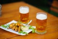 beer with meal on the table