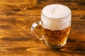 Beer mug full of cold fresh alcohol drink Royalty Free Stock Photo