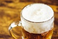 Beer mug full of cold fresh alcohol drink Royalty Free Stock Photo