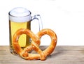 Beer Mug with German Pretzel on wooden table