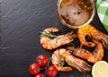 Beer mug and grilled shrimps Royalty Free Stock Photo