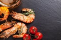 Beer mug and grilled shrimps on stone plate Royalty Free Stock Photo