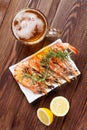 Beer mug and grilled shrimps Royalty Free Stock Photo