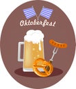 A beer mug, a sausage on a fork with a bretzel