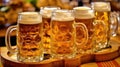 Beer mugs with fresh pretzels or brezen at Oktoberfest, Munich, Germany