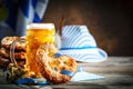 Beer mugs and pretzels on a wooden table. Oktoberfest. Beer festival. Royalty Free Stock Photo