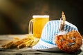 Beer mugs and pretzels on a wooden table. Oktoberfest. Beer festival. Royalty Free Stock Photo