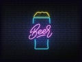 Beer neon glowing sign. Bright vector label of beer mug and lettering