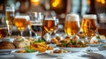 Beer pairing dinner setup featuring gourmet dishes and various beers on a dining table Royalty Free Stock Photo