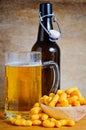 Beer and peanut curls Royalty Free Stock Photo