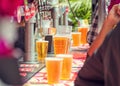 Beer and people at outdoor bar. Royalty Free Stock Photo