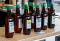 Beer in plastic bottles stand on outdoor showcase