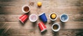 Beer pong. Plastic red and blue color cups and ping pong balls on wood, banner