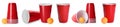 Beer pong. Set with red plastic cups and balls on white background, banner design Royalty Free Stock Photo