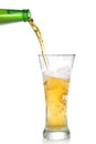 Beer pouring from bottle into glass Royalty Free Stock Photo