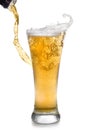 Beer pouring from bottle into glass Royalty Free Stock Photo