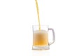 Beer pouring into half full glass over white background Royalty Free Stock Photo