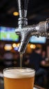 Beer pouring from tap in bar Royalty Free Stock Photo
