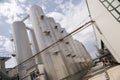 Beer processing and storage silos in beer factory Royalty Free Stock Photo