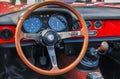 Vintage Alfa Romeo car interior - steering wheel dashboard and gear shift Royalty Free Stock Photo