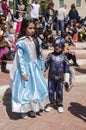 Beer-Sheva, ISRAEL - March 5, 2015: Girl in a blue dress princess and the boy in a blue suit astronaut