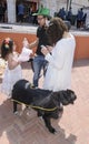 Beer-Sheva, ISRAEL - March 5, 2015: Mother, father, daughter and dog on a city street