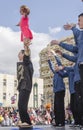 Beer-Sheva, ISRAEL - March 5, 2015: Performance of gymnasts with a girl on the street scene - Purim