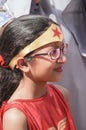 Beer-Sheva, ISRAEL - March 5, 2015: Portrait of girl in red with dark hair wearing glasses and a bandage on his head with a star