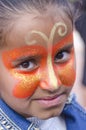 Beer-Sheva, ISRAEL - March 5, 2015: Portrait of young brunette girl with make-up butterfly on her face - Purim Royalty Free Stock Photo