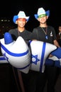 Beer-Sheva, ISRAEL - March 2012:Two guys in cowboy hats are selling balloons on the day of Israels Independence