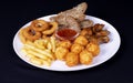 Beer snack fried cheese balls, french fries, chicken wings, bread, squid