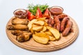 Beer snack set with tomato sauce, adzhika on a wooden board Royalty Free Stock Photo