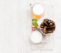 Beer snack set. Pint of pilsener in mug and rye bread croutons with garlic cream cheese sauce over white painted old Royalty Free Stock Photo